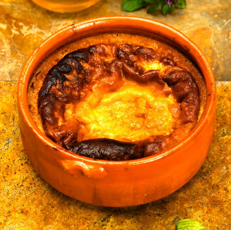 Baked custard pudding (eggs, sugar, wheat flour, milk and cinnamon)